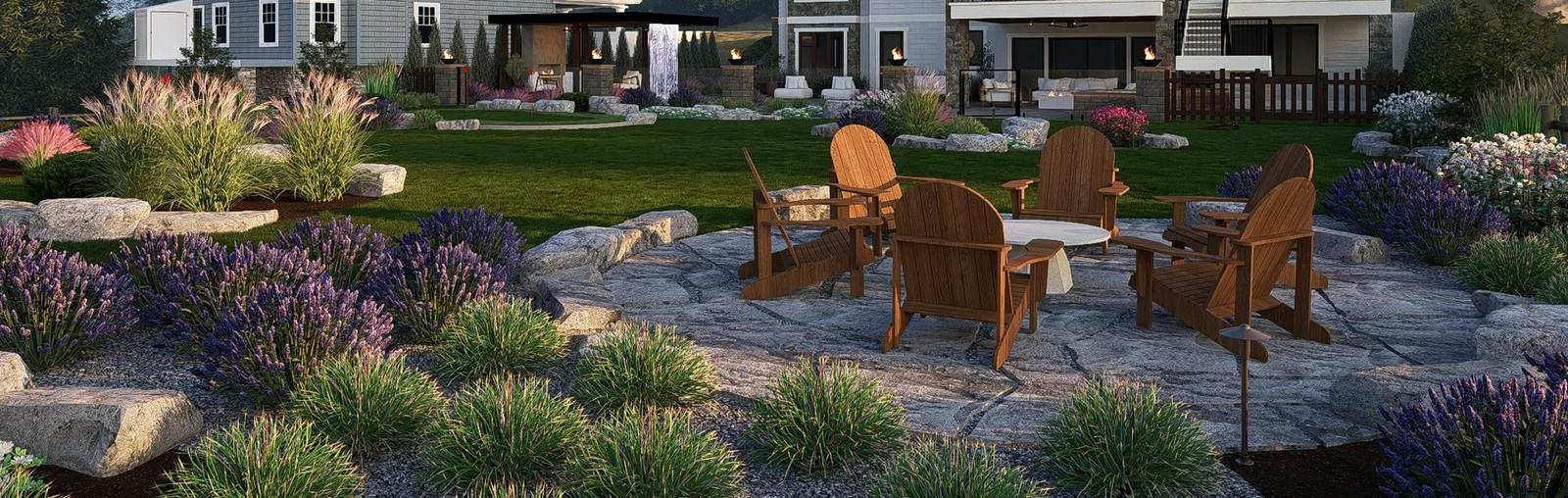 Backyard with boulder retaining walls and a flagstone terrace